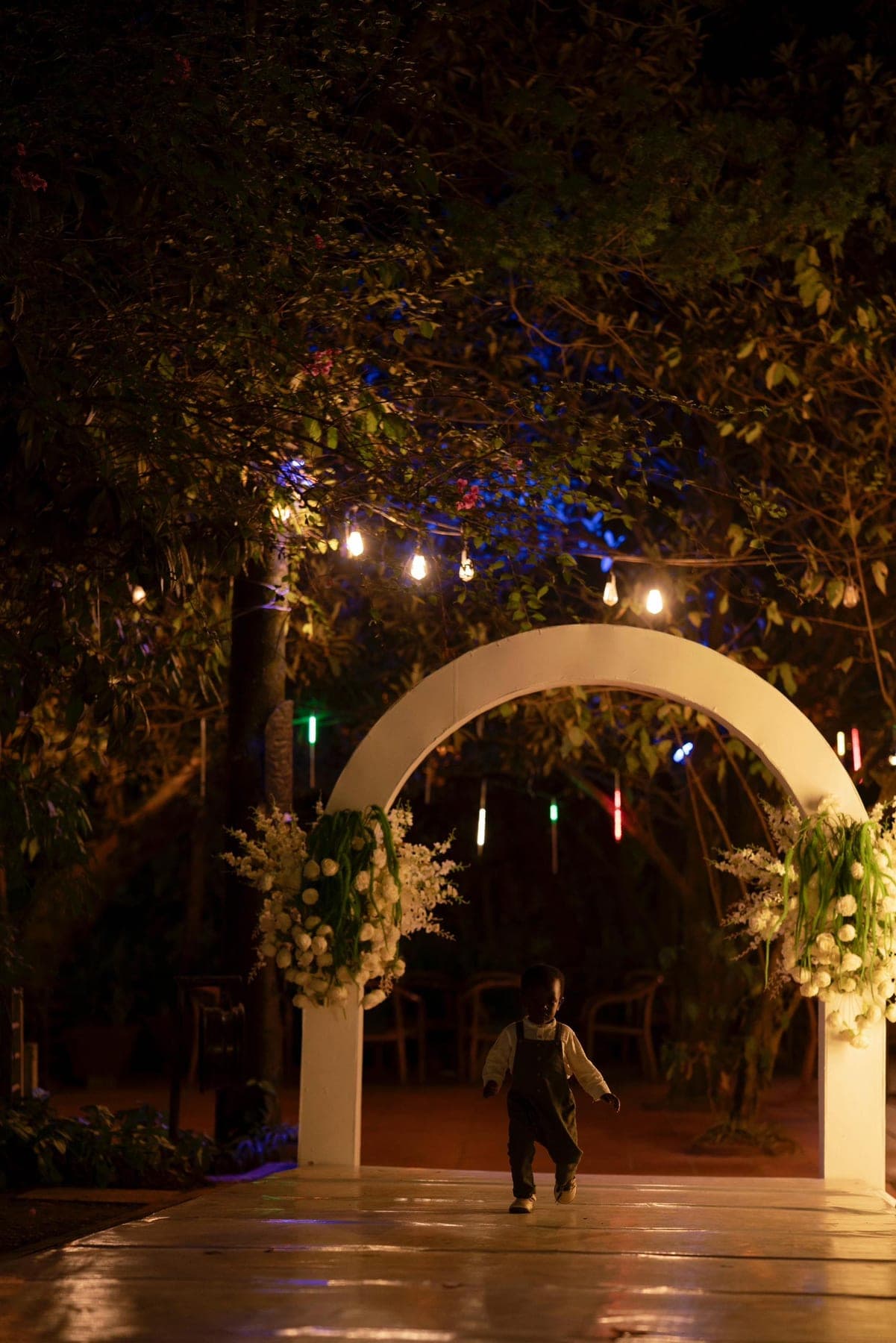 The ceremony arch lit after dark